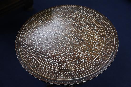 An early 20th century Indian ivory and bone inlaid circular tripod table, table W.1ft 8in.